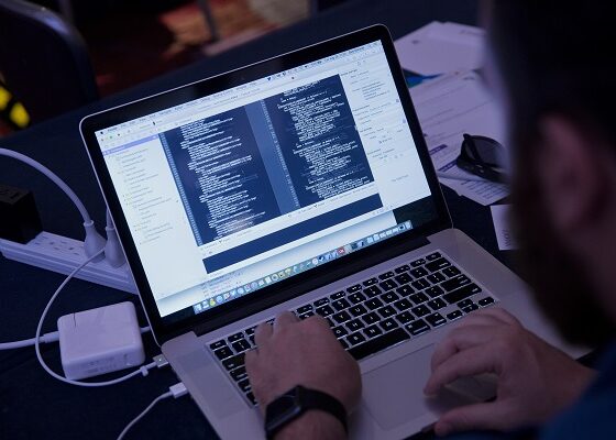 An attendee working on an Apple Inc. laptop computer participates in the Yahoo! Inc. Mobile Developer Conference Hackathon in New York, U.S., on Tuesday, Aug. 25, 2015. The Hackathon is an opportunity for mobile developers to come together and hack around the Yahoo! Inc. Mobile Developer Suite. Photographer: Victor J. Blue/Bloomberg