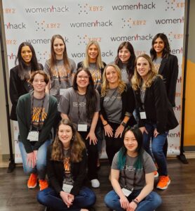X by 2 women at WomenHack event