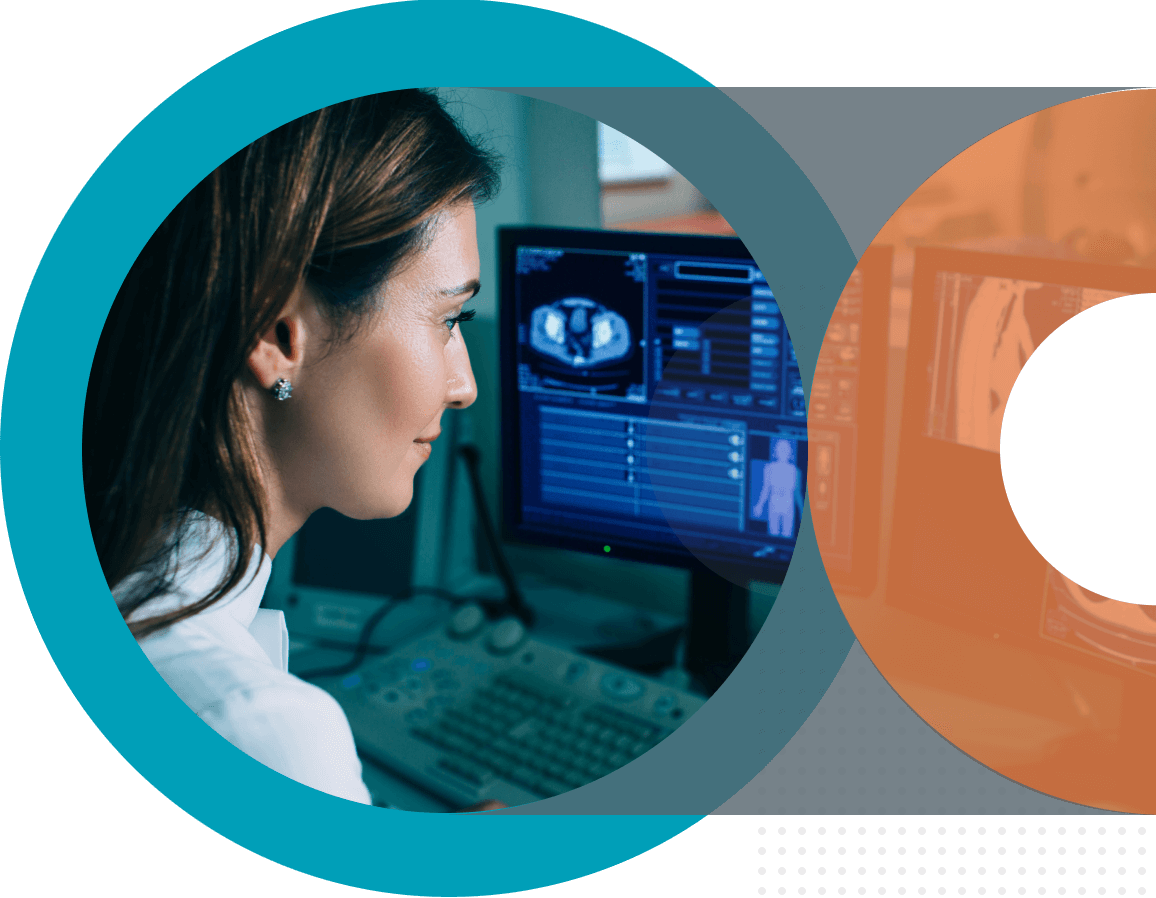 Healthcare professional analyzing clinical data on a computer, showcasing technology solutions for healthcare providers