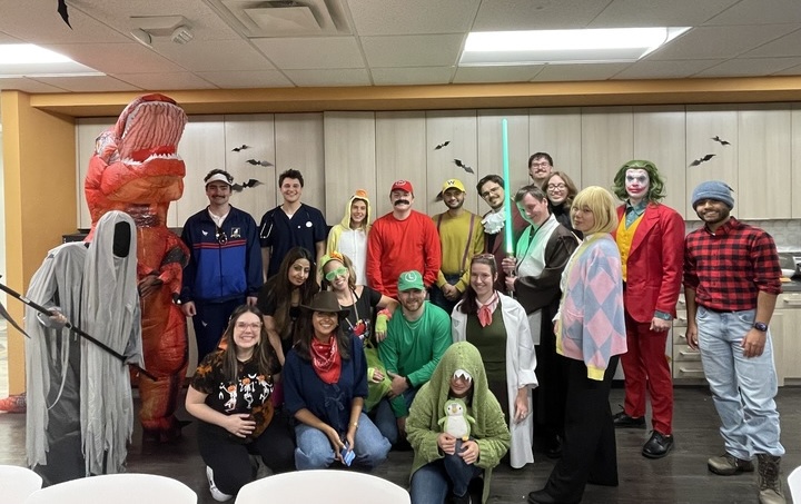 X by 2 team dressed for Halloween